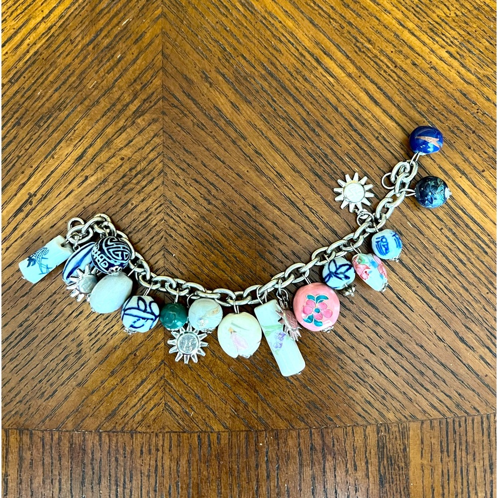 Charm bracelets are back in Fashion!
Asian inspired  8” Charm Bracelet.